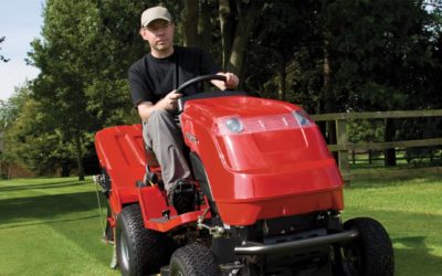 Man on a red lawnmower