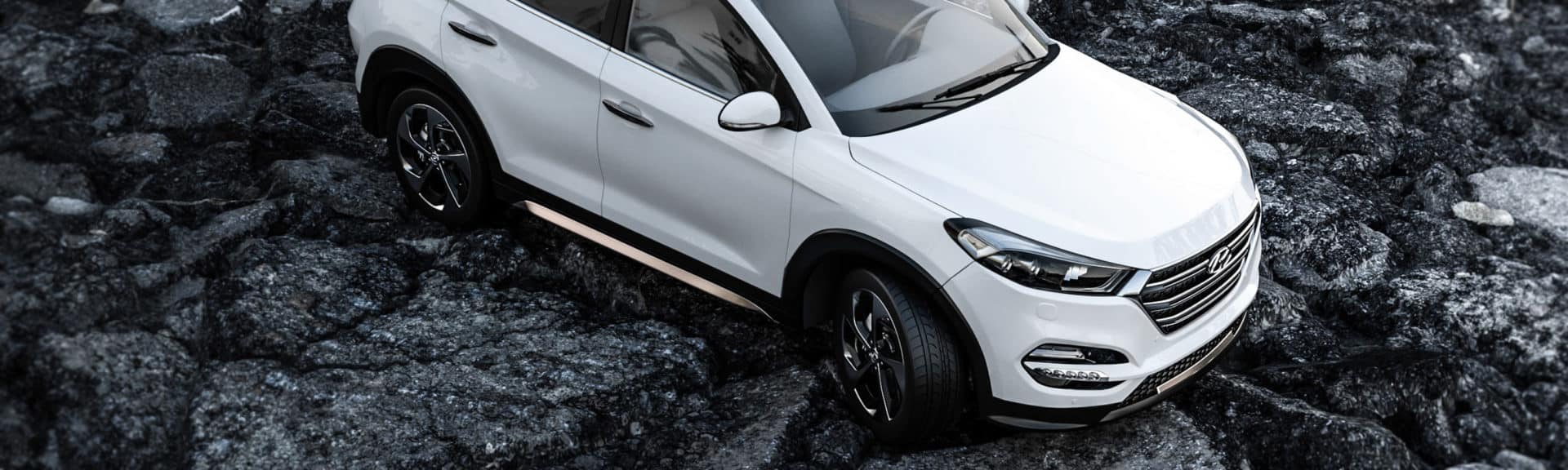 White Car on Rocky Terrain