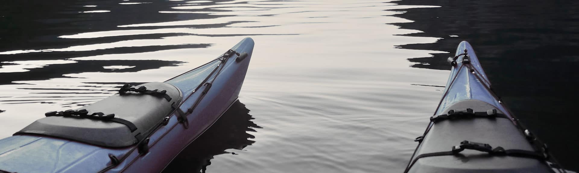 Two Canoe Boats on Water